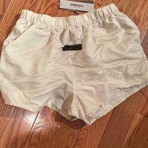 Fear of God Essentials Women's Cream Athletic Shorts unisex